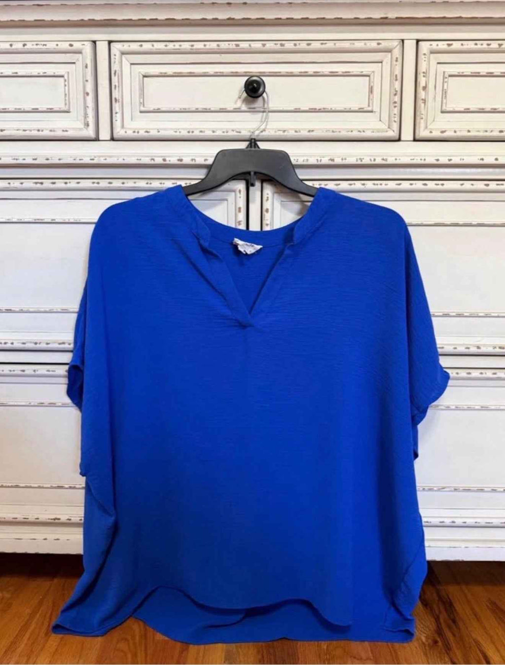 Plus-size royal blue V-neck blouse side view