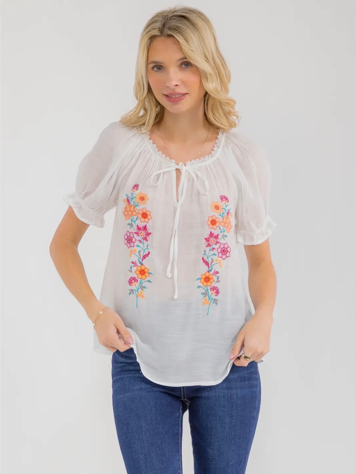 Blu Pepper embroidered V-neck blouse on model