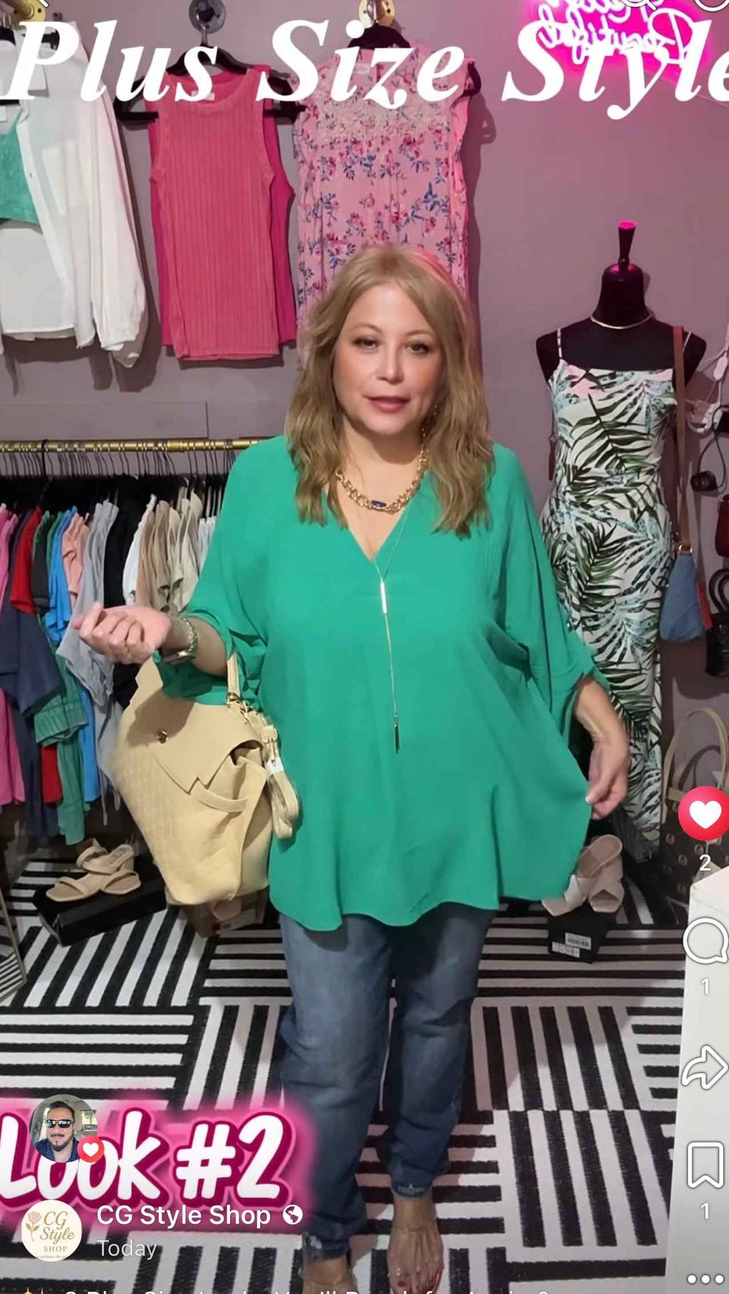 Plus-size green flowy dolman-sleeve blouse styled view