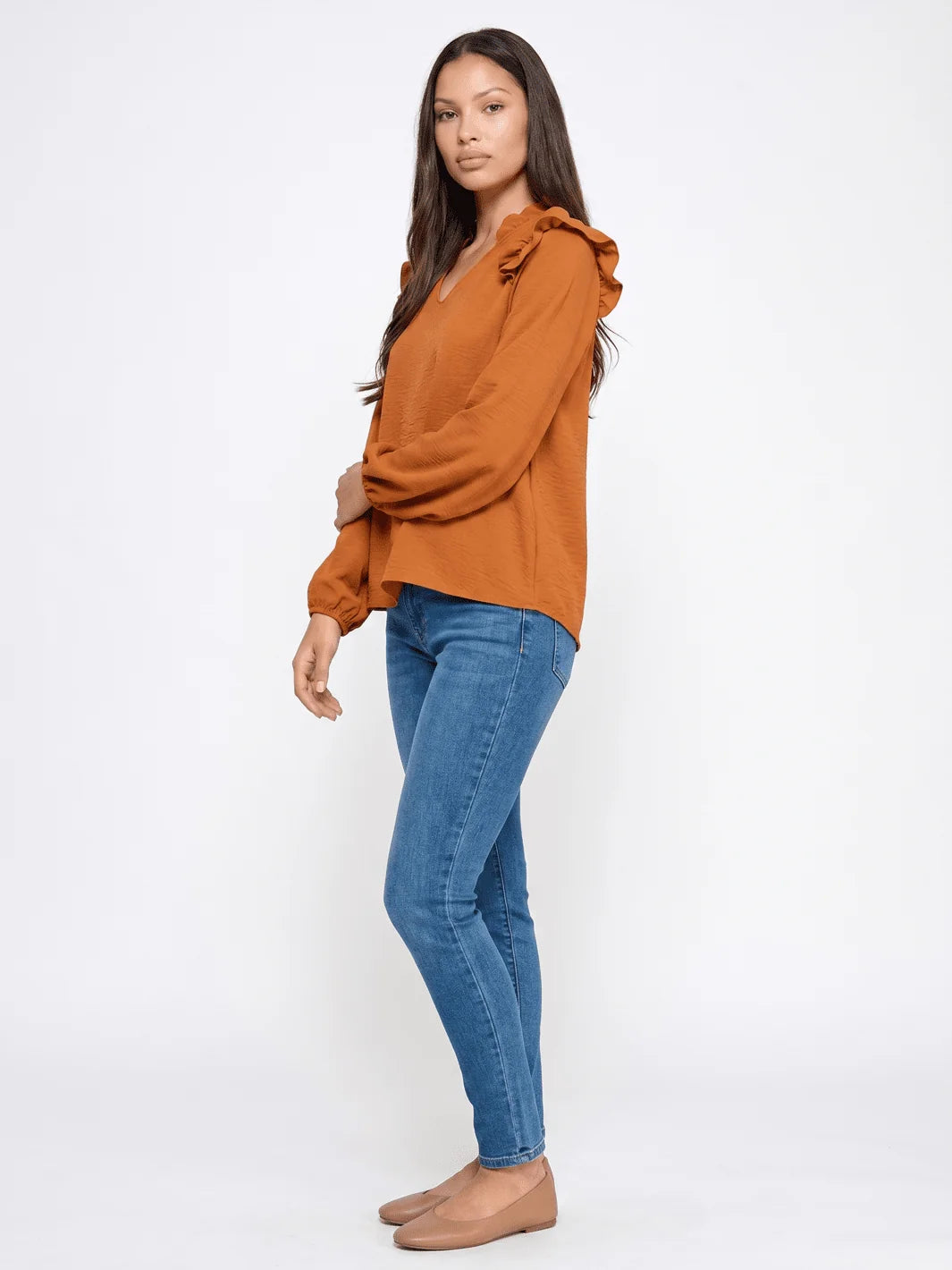 Womens teal and burnt orange long sleeve v-neck blouse front view
