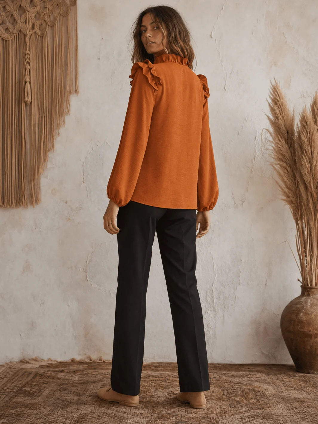 Womens teal and burnt orange long sleeve v-neck blouse front view