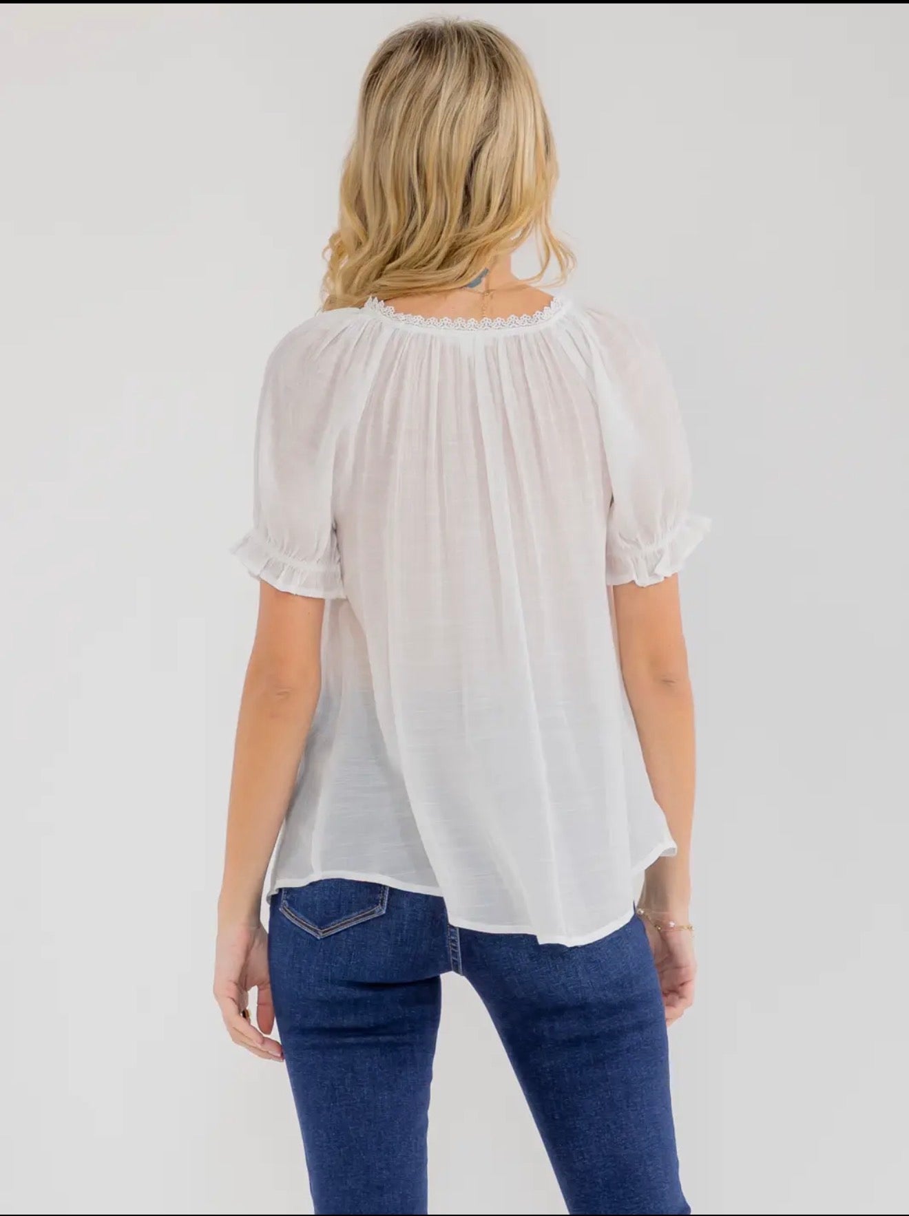 Floral embroidery and tie-front detail