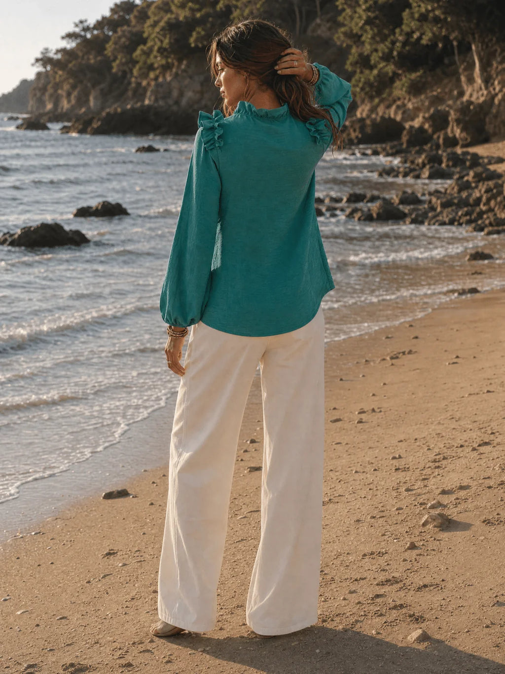 Womens teal and burnt orange long sleeve v-neck blouse front view