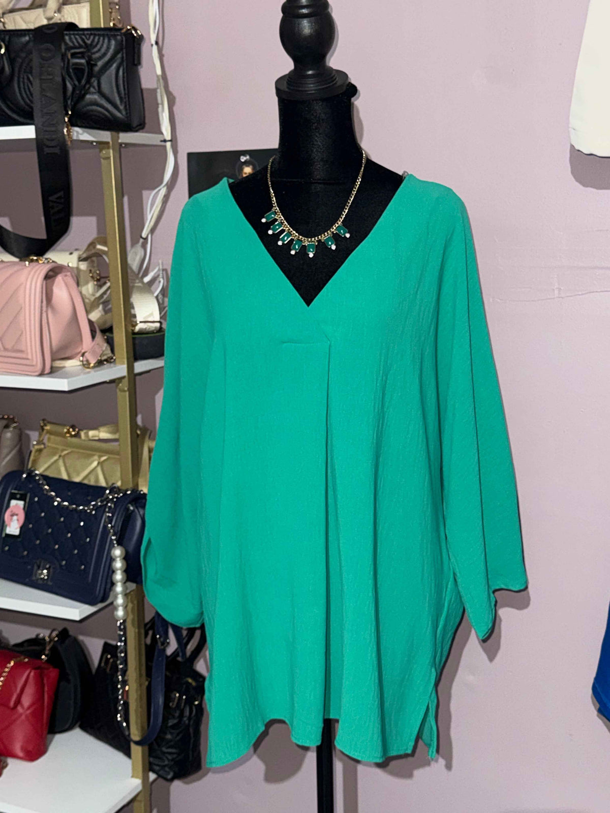 Plus-size emerald green dolman V-neck blouse front view