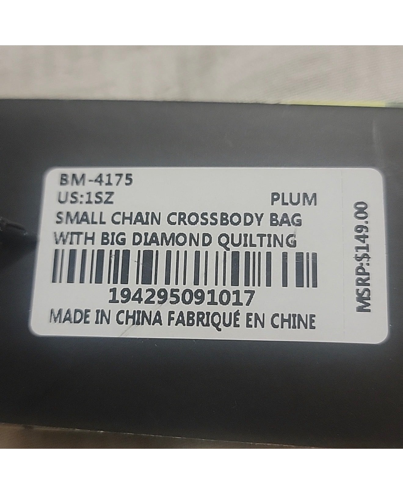 Badgley Mischka BM-4175 product label showing plum color and MSRP
