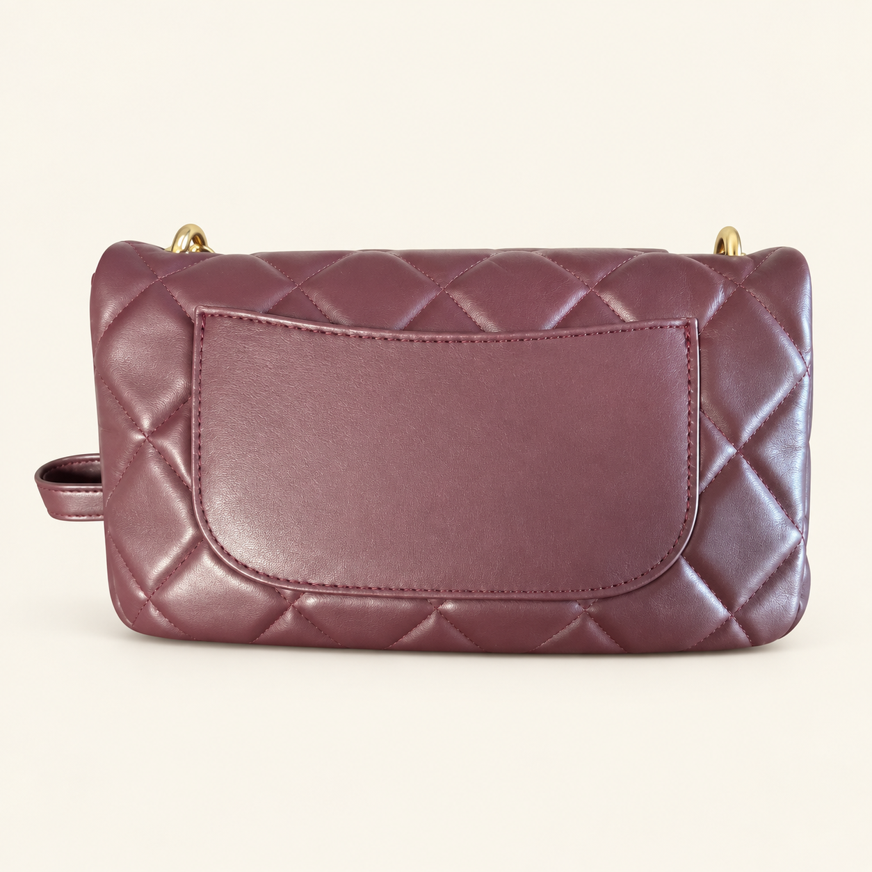 Back view of Badgley Mischka burgundy quilted messenger bag