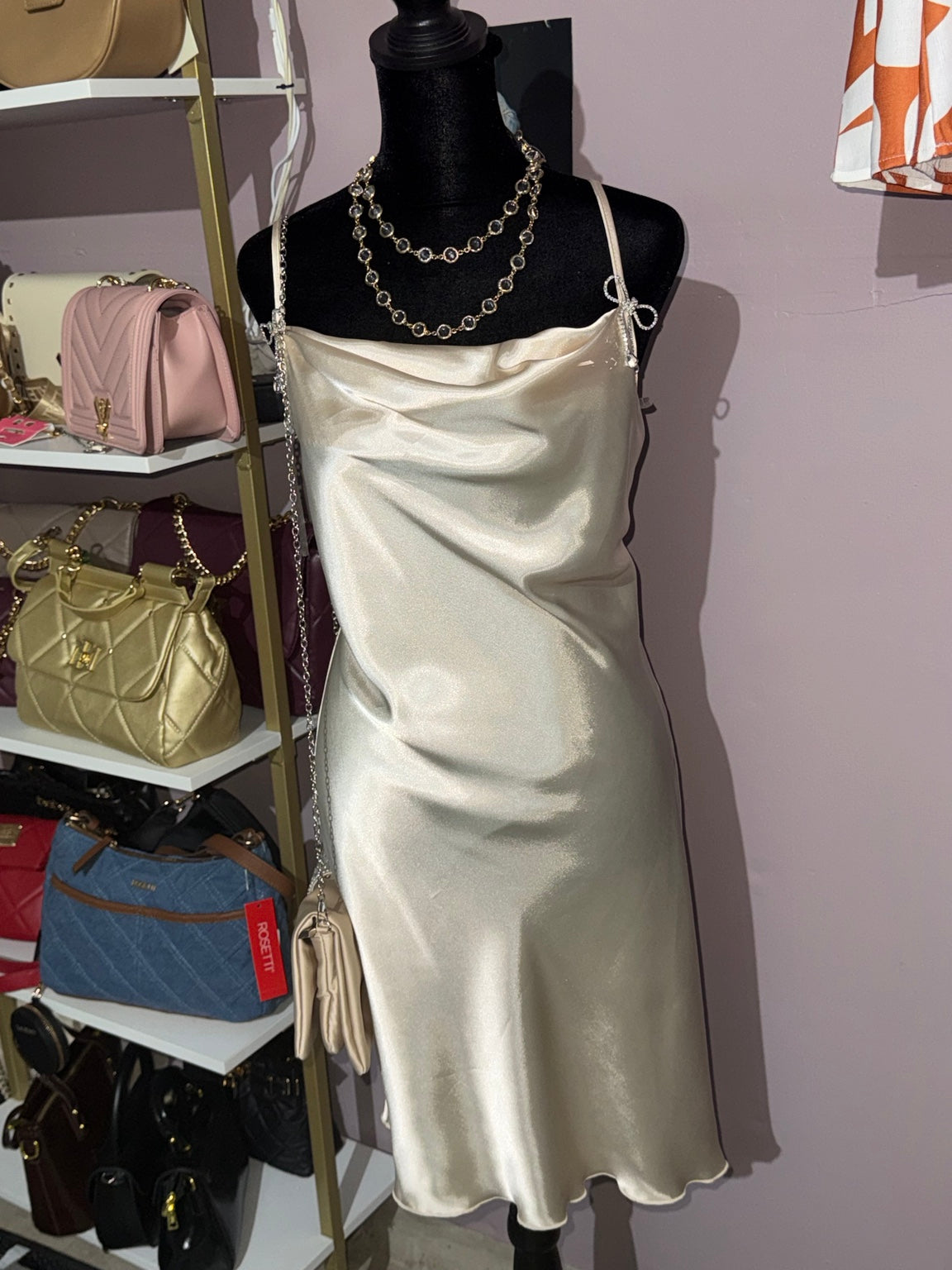Bebe ivory satin cowl-neck slip mini dress with rhinestone bow straps, front view