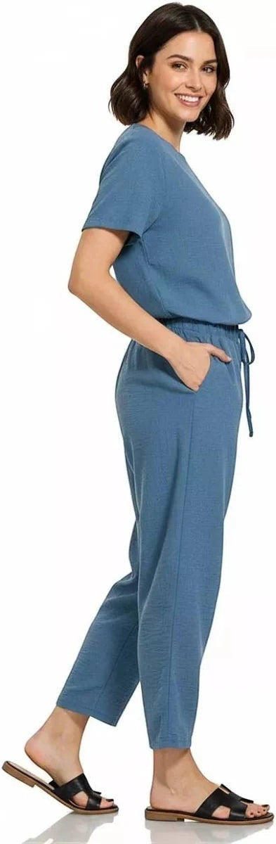 CG Style Shop blue woven crepe elastic waist pants with drawstring and pockets.