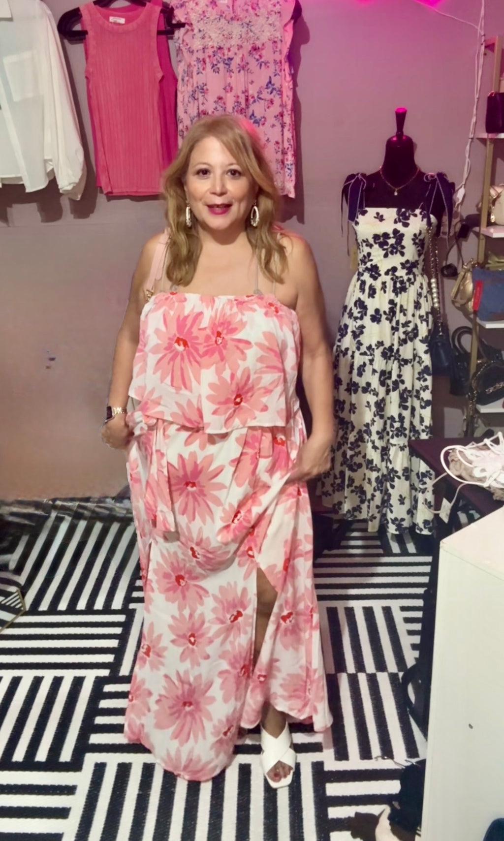 Emily Wonder pink floral strapless maxi dress showing the front slit and flowing skirt