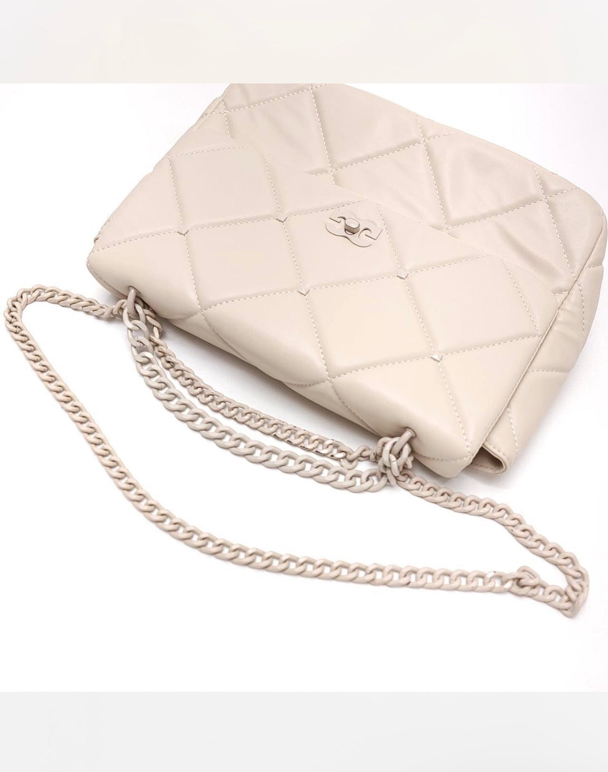 Gilda Paris bone crossbody angled view with chain strap