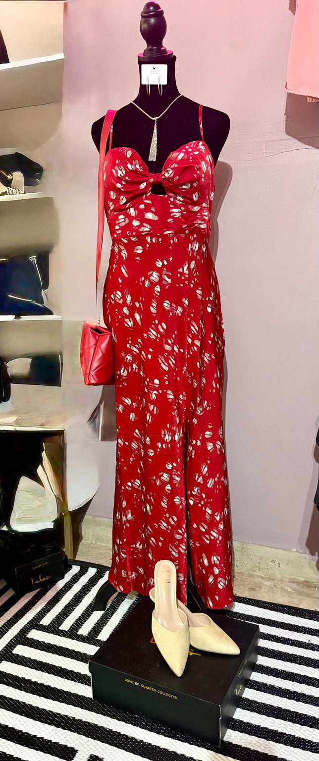 Saints + Secrets red abstract print twist-front maxi dress on mannequin